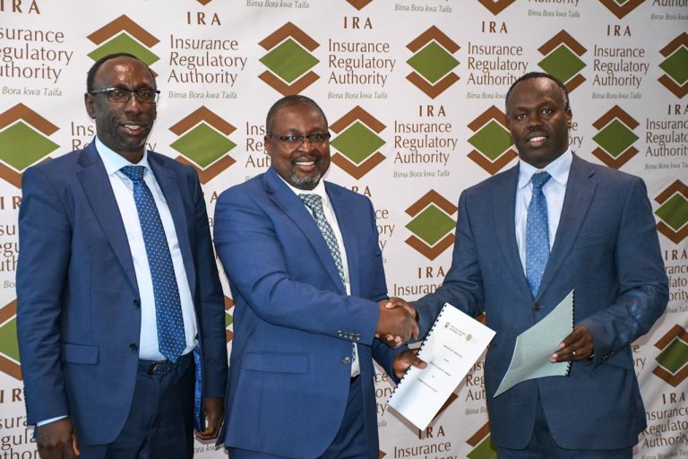 From left to right: Hon. Moses K. Cheboi, Chairman ACC, George Nyakundi, Commission Secretary/ CEO ACC, exchange the signed MoU to Godfrey Kiptum, the Commissioner of Insurance/ CEO IRA, during the event.