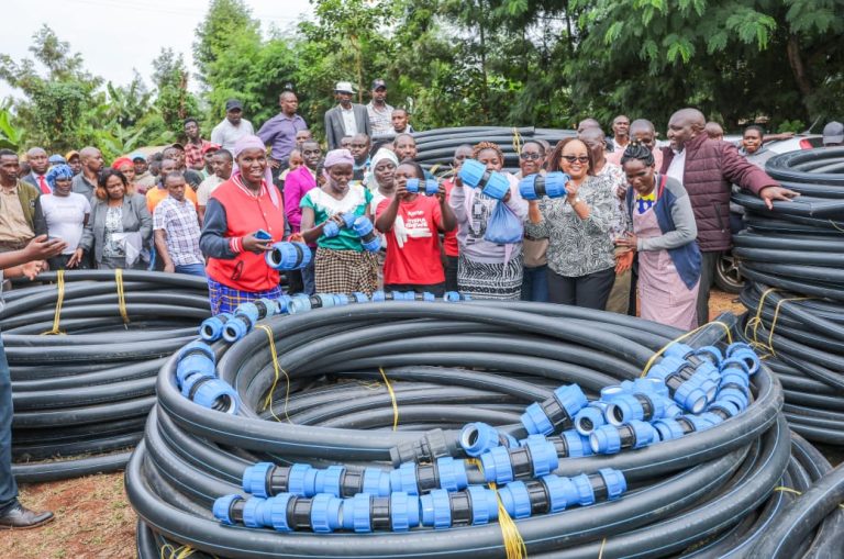 Governor Ann Waiguru, surrounded by her administration officials and some constituents during the handing over ceremony