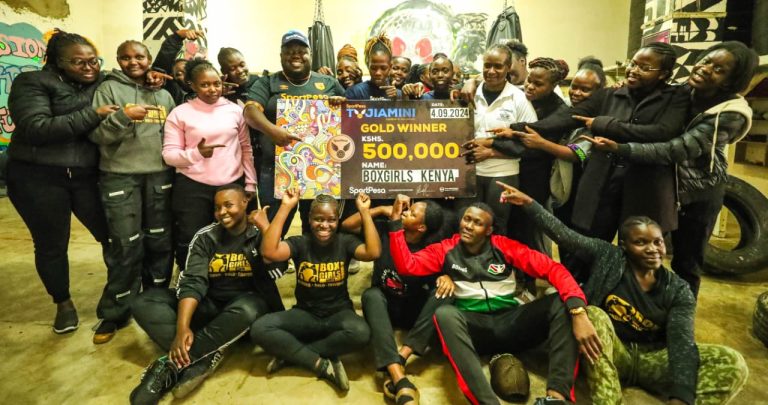 Box Girls Kenya Members receiving the Tujiamini Gold Winner Award at the Box Girls Sport Centre, Light Industry, Kariobangi