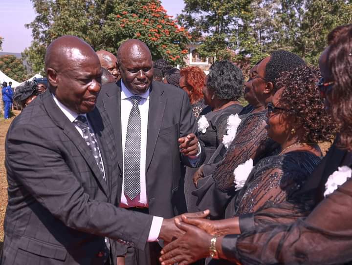 Deputy President Rigathi Gachagua being introduced to the family of the deceased by one of his sons David Langat.