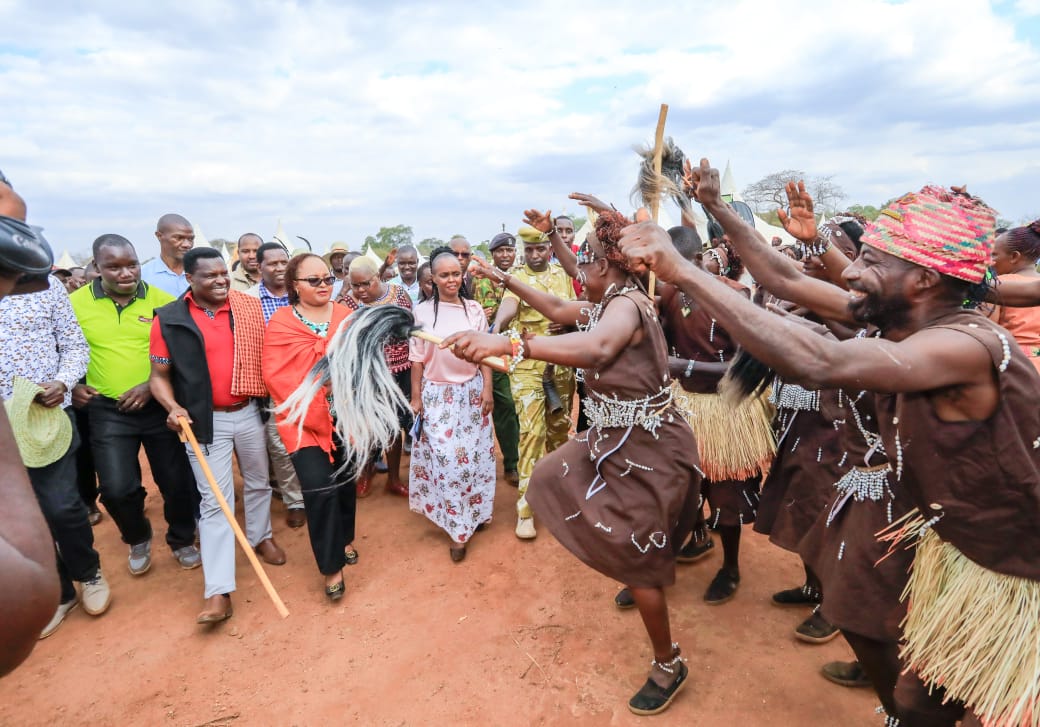 Governors Ann Waiguru and Muthomi Njuki as well as other leaders being entertained by traditional dancers