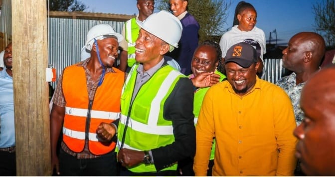 Kiambu county governor Kimani Wamatangi (in green jacket) during the launching ceremony.