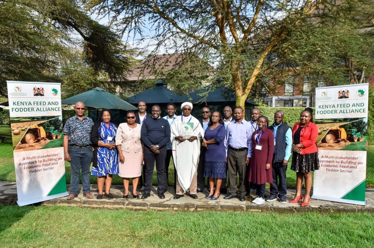 Stakeholders pose for a group photo after a consultative meeting on livestock feed and fodder security.