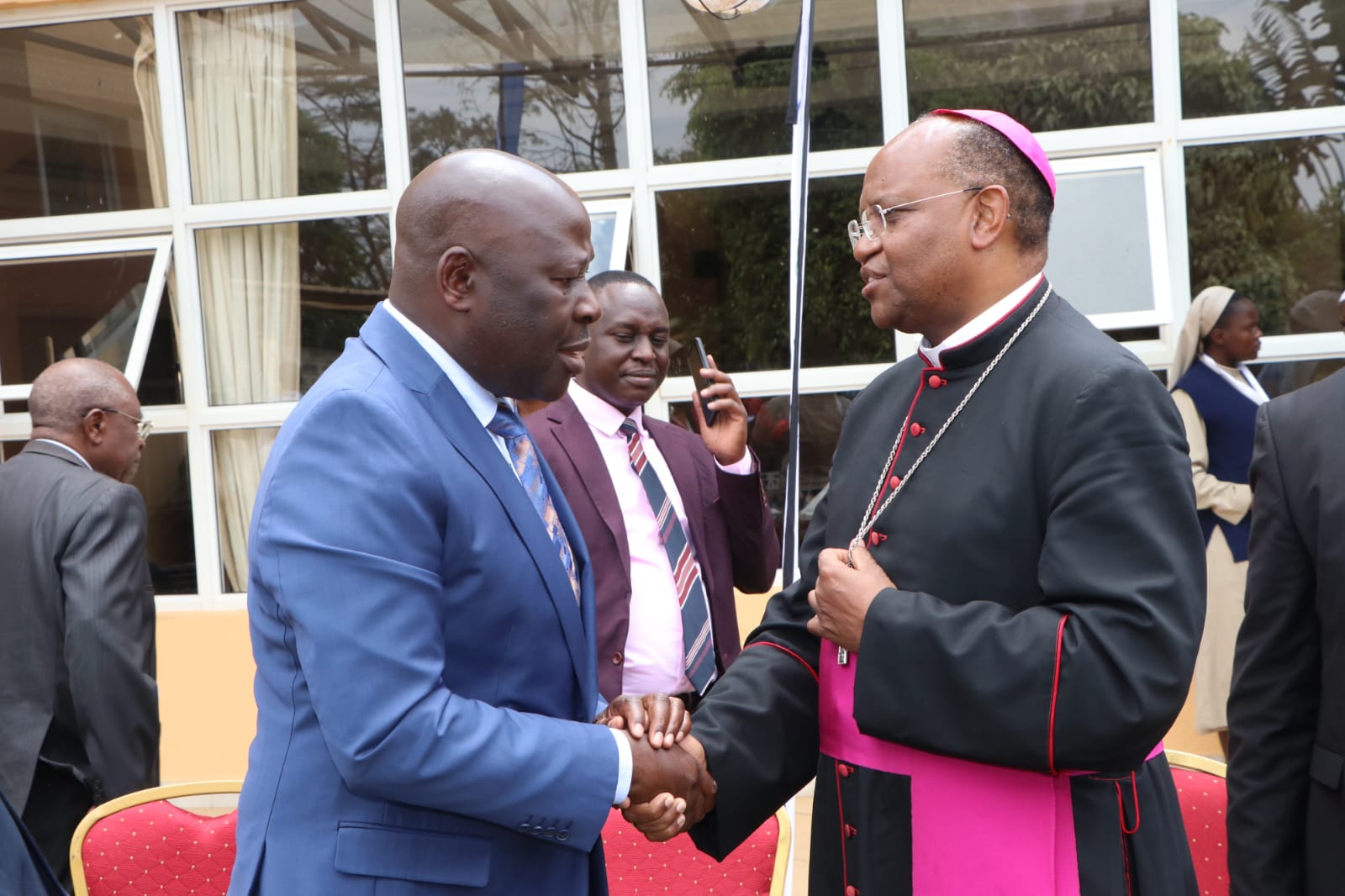 The PS for Social protection Joseph Mogosi and Archbishop Muheria in picture