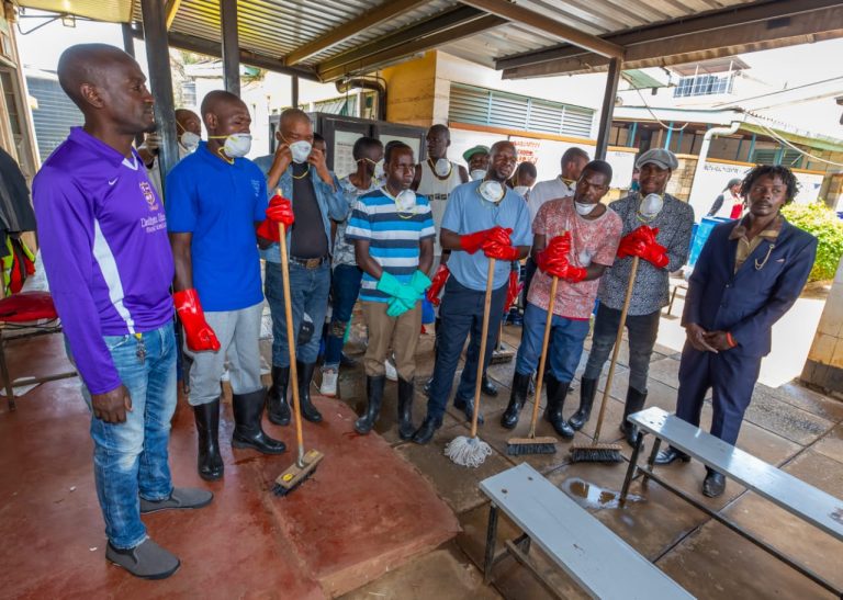 The group helping to clean the health facility.