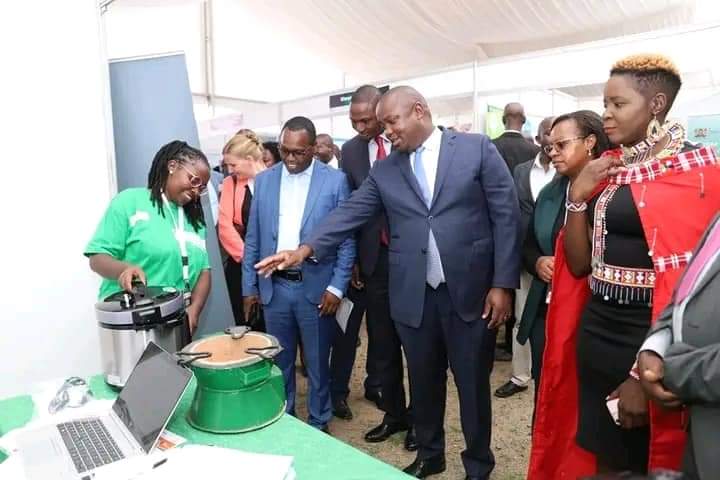 Energy Principal Secretary Alex Wachira admiring some of wares exhibited during the forum