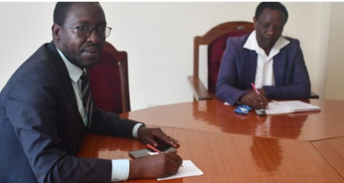 Kiambu Town Constituency NG-CDF chairman Joseph Karanga with Fund Manager Aloysius Njoroge during the interview.