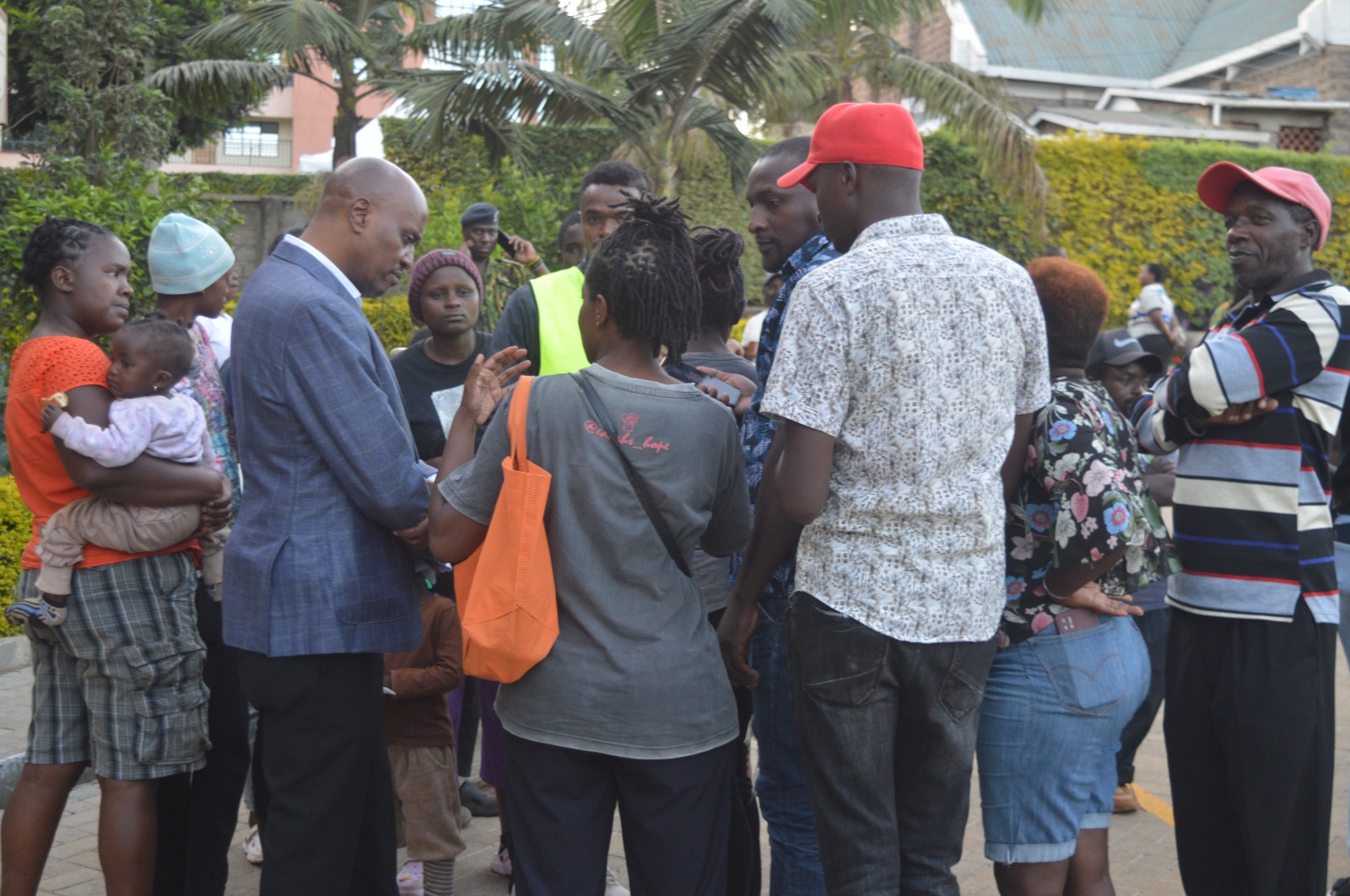 Kiambu Township MP Machua Waithaka (Left) listening to the views of Thindigua residents during a public participation forum