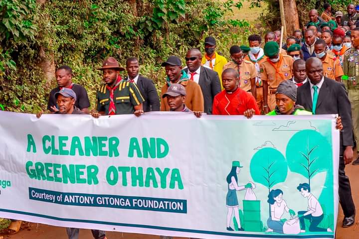 Othaya constituency residents in procession before embarking on cleaning and tree planting exercise last Saturday.