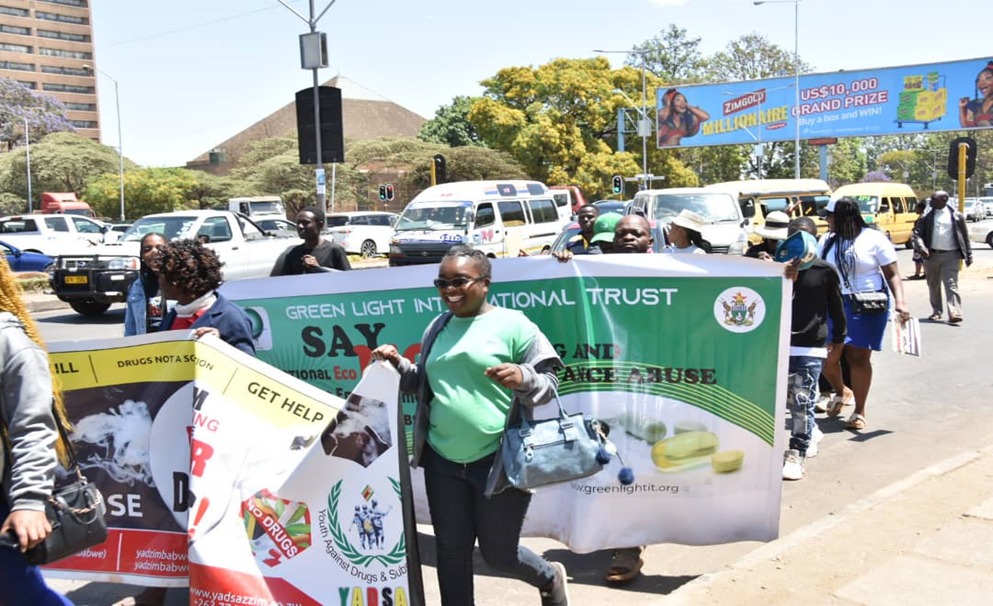 The Community marching in the streets of Harare