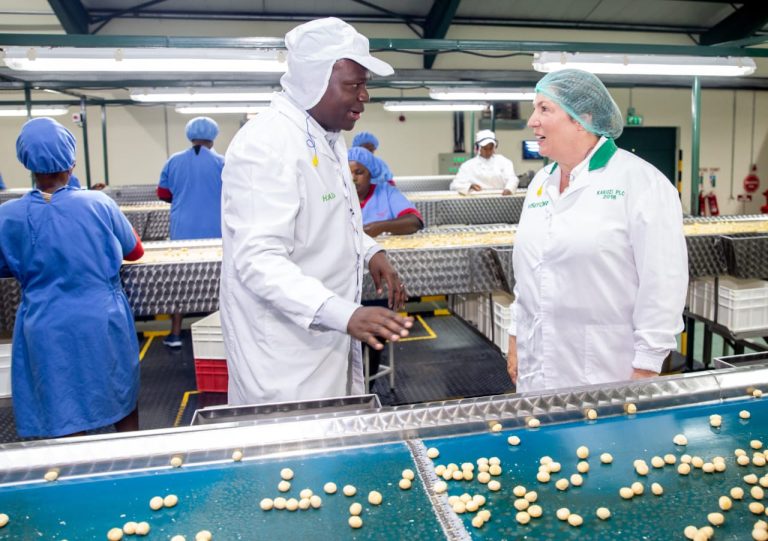 Kakuzi Group Manager - Macadamia Henry Owino with World Macadamia Organisation CEO Jillian Laing
