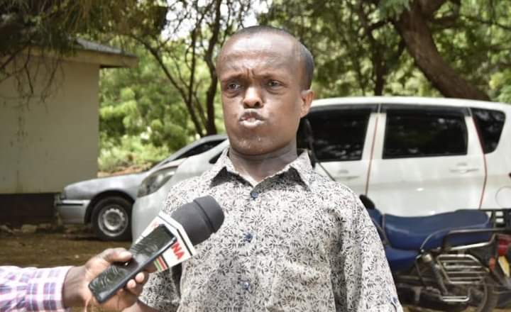 Mohamed Siyad, a PWD in Garissa addressing journalists