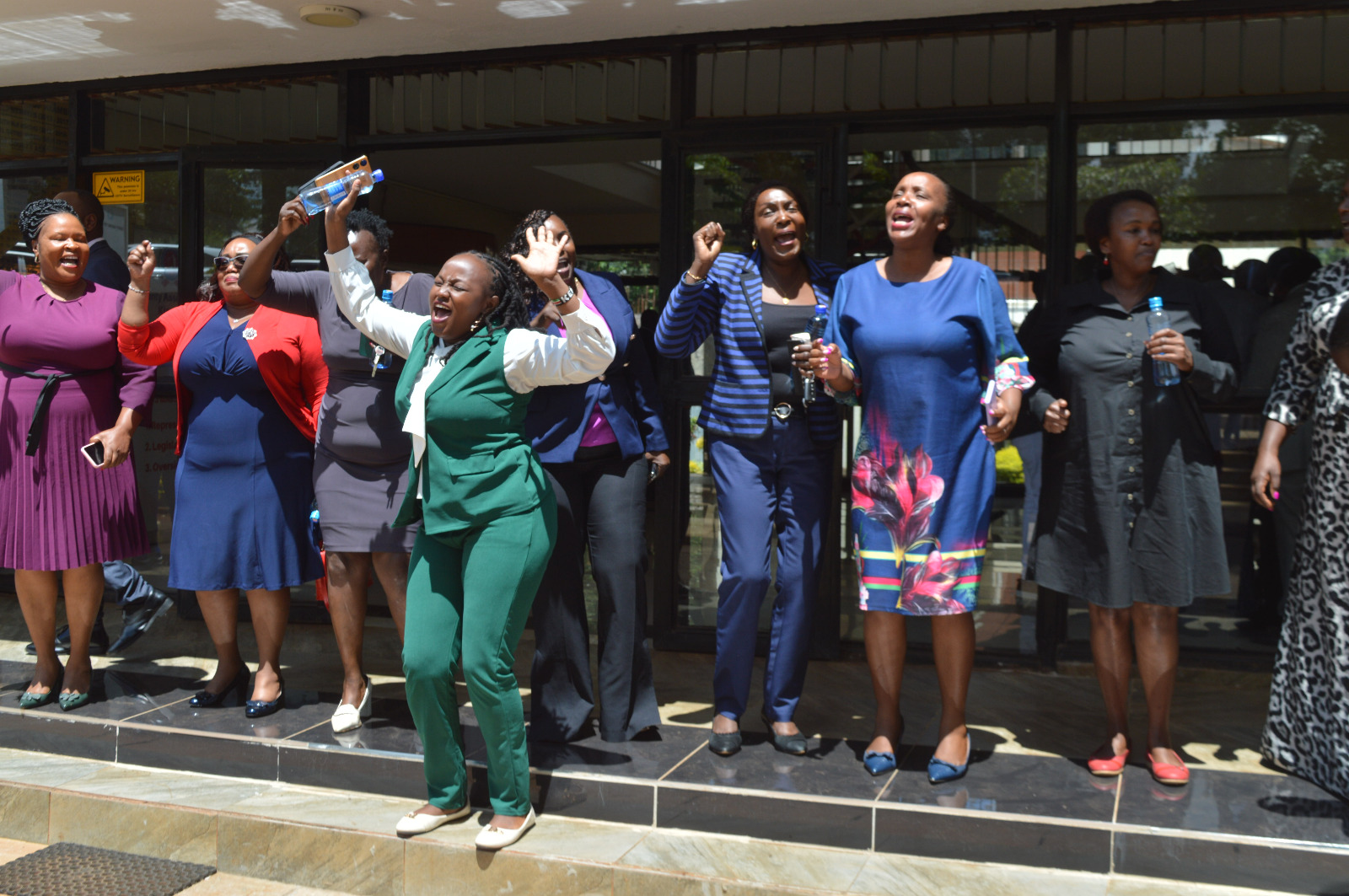 Nominate MCAs celebrating outside the Kiambu County Assembly after the court issued conservatory orders to suspend the debating and passing of a motion that seeks to ammend standing orders to allow voting through