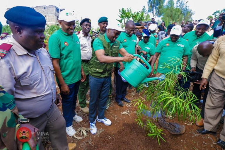 PS Omollo during a tree planting session at Ondiri Wetlands in Kikuyu,Kiambu County.