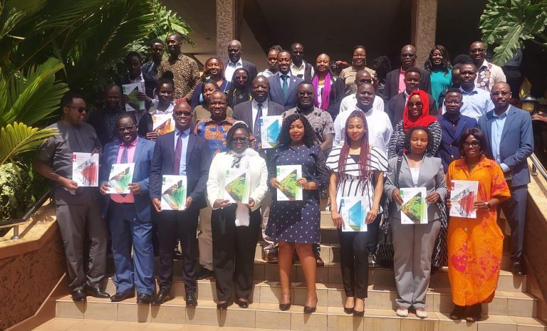 Attendees pose for a photo during the launch of the Just Transition Platform’s (JTP)