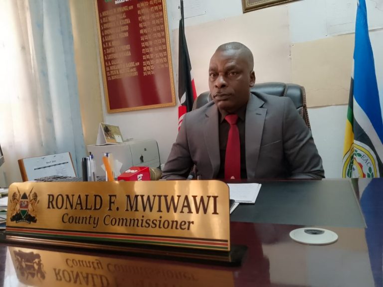 Nyeri County Commissioner Ronald Mwiwawi addressing the media in his office.