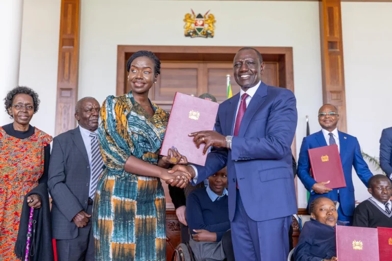 President William Ruto with Nominated Senator Crystal Asige after he assented to the Persons with Disabilities Bill