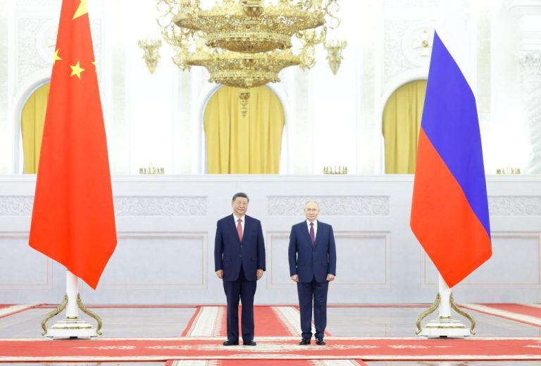 Russian President Vladimir Putin holds a welcome ceremony for Chinese President Xi Jinping