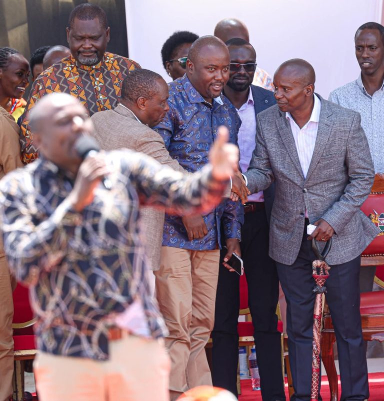 Deputy President Prof Kithure Kindiki consulting with other leaders during the Empowerment forum at Kibirichia, Meru County last Saturday.