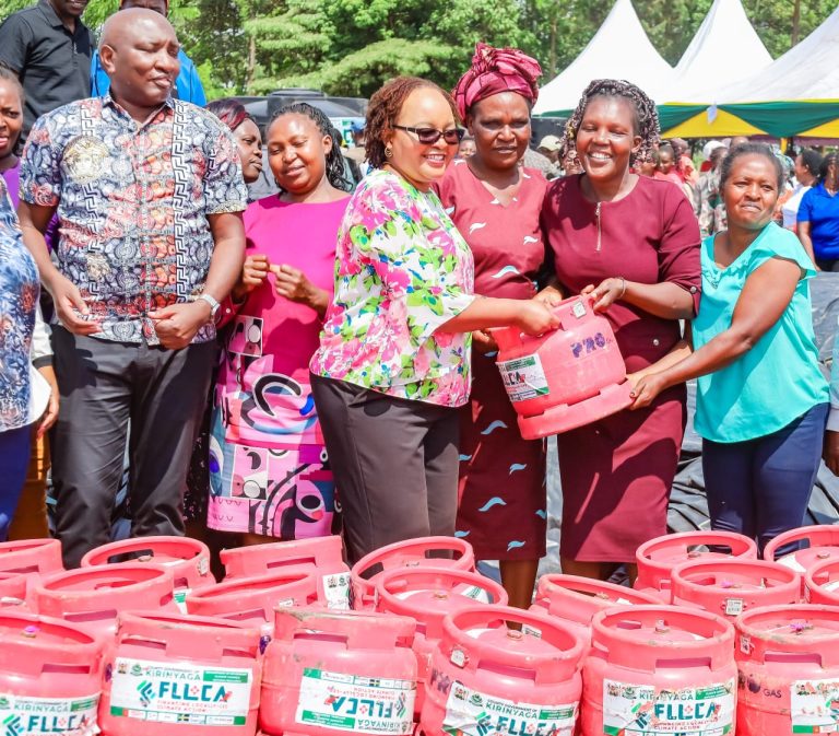 Governor Ann Waiguru with some of beneficiaries.