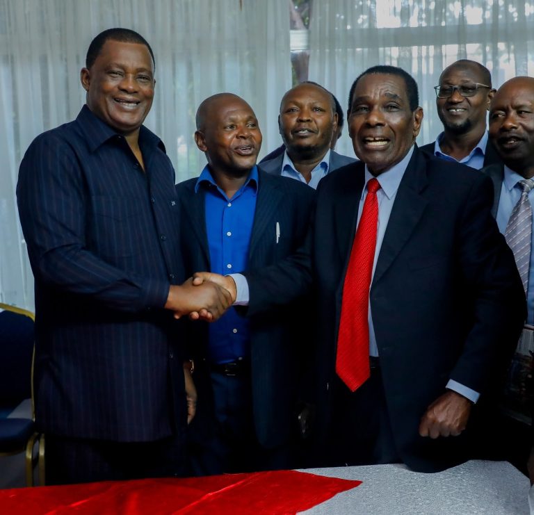 Justin Muturi (left) being congratulated by DP's National Executive Committee members led by the party chairman Essau Kioni