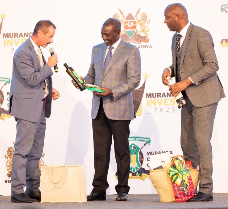 Kakuzi PLC Managing Director, Mr Chris Flowers (left), presents value-added products