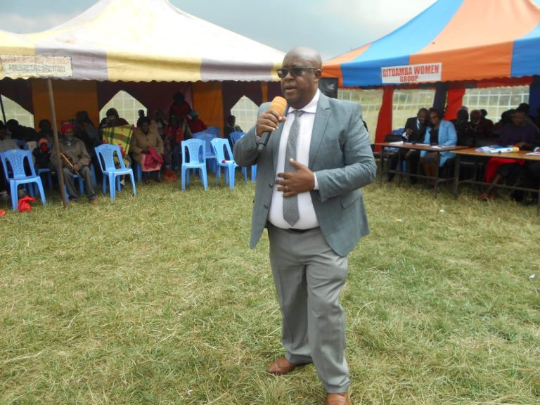 Lari MP Mburu Kahangara addressing education stakeholders at Gituamba primary school in his constituency on Wednesday.