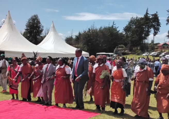 Nyandarua County Governor Kiarie Badilisha and other leaders joins dancers during the Madaraka Day celebrations on Sunday.