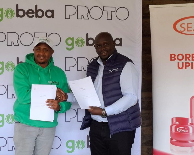 PROTO Energy Limited CEO Joel Kamau and GoBEBA Everything Ltd Co-founder Peter Ndiangui during the signing of a strategic partnership agreement