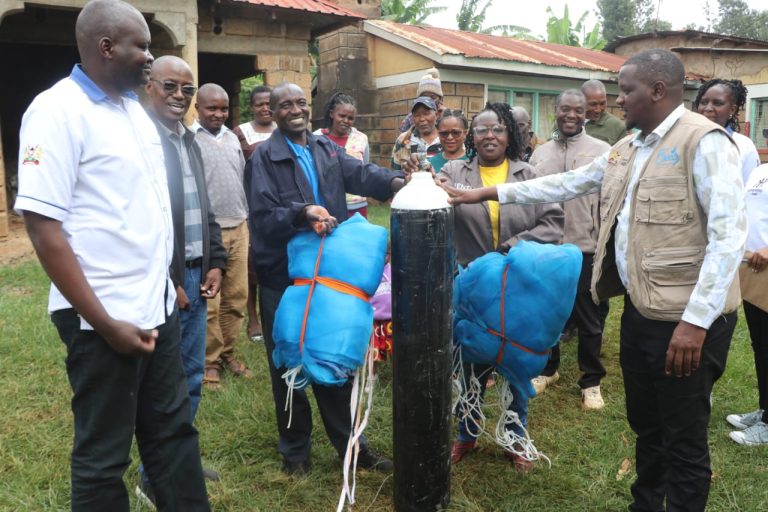 Tharaka Nithi County Fisheries officials led by Chief Officer Mr Antony Kiruya issue oxygen cylinders and Hapa Nets to hatcheries.