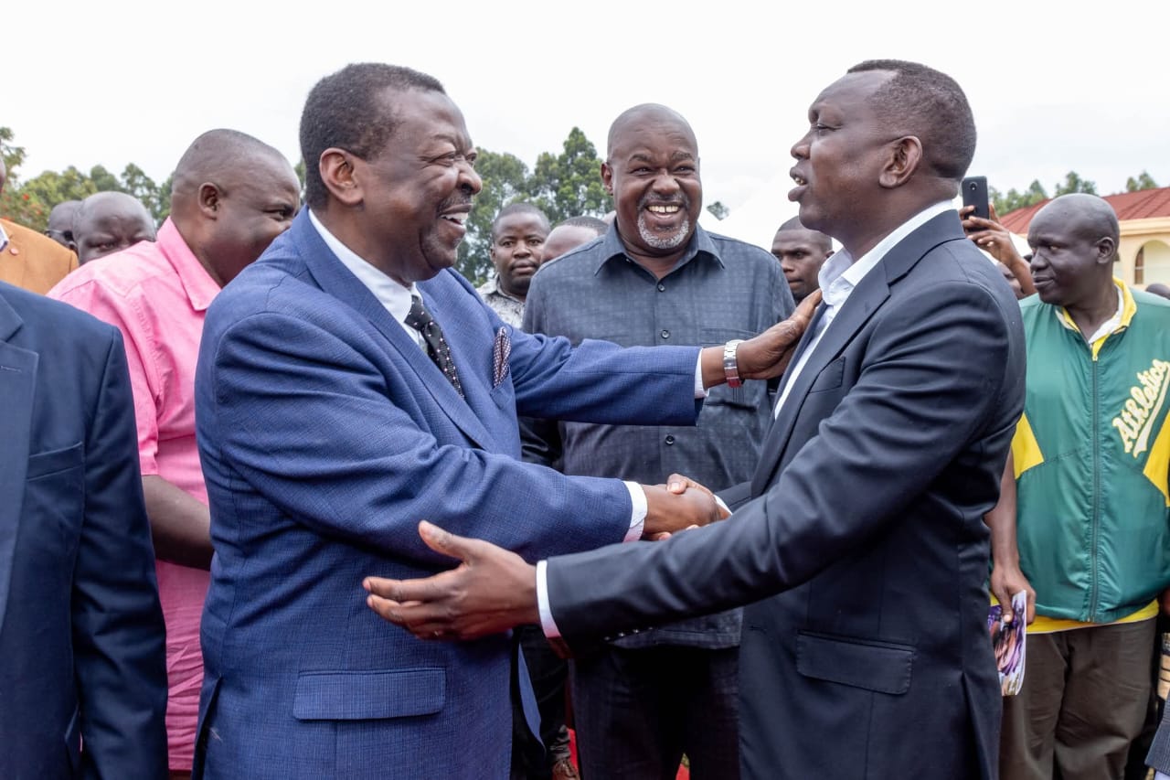 Prime Cabinet Secretary Musalia Mudavadi with Kapsaret MP Oscar Sudi and Caled Kositany