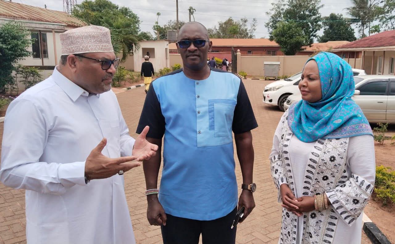 From left PS for Science, Research and Innovation Prof Abdulrazak Shaukat has a word with Kwale County Commissioner Stephen Orinde
