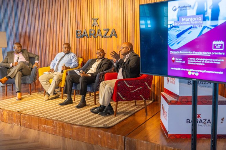Media personality Dennis Okari moderating a session with Economic and public policy analysts