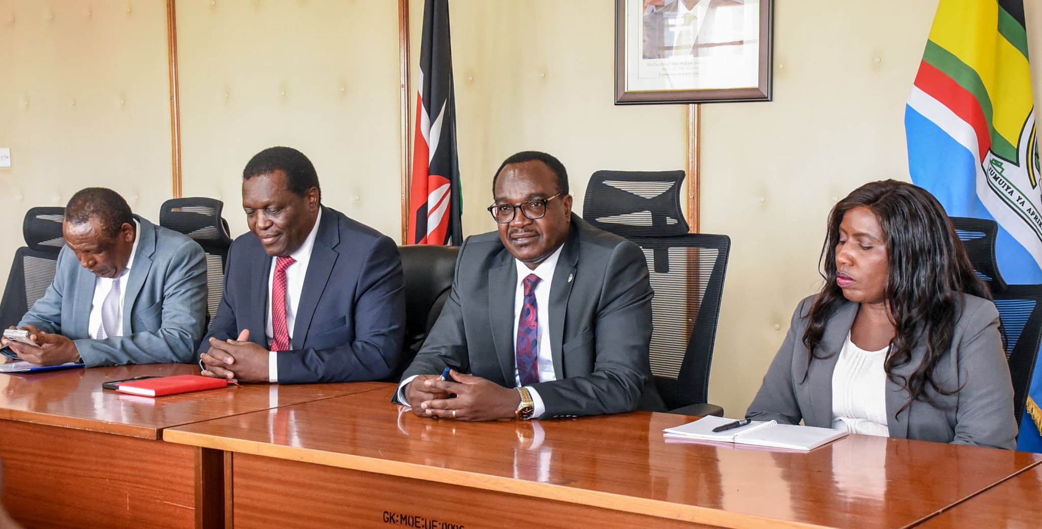 Cabinet Secretary Julius Ogamba and Higher Education Principal Secretary Beatrice Inyangala.