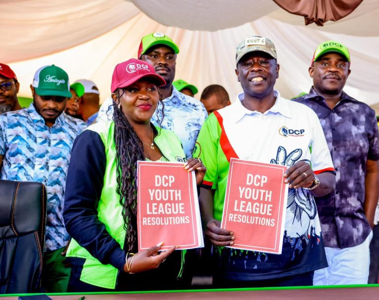DCP party leader Rigathi Gachagua with party's Executive Director Brenda Banjira with a document containing Youth resolutions after yesterday's meeting.