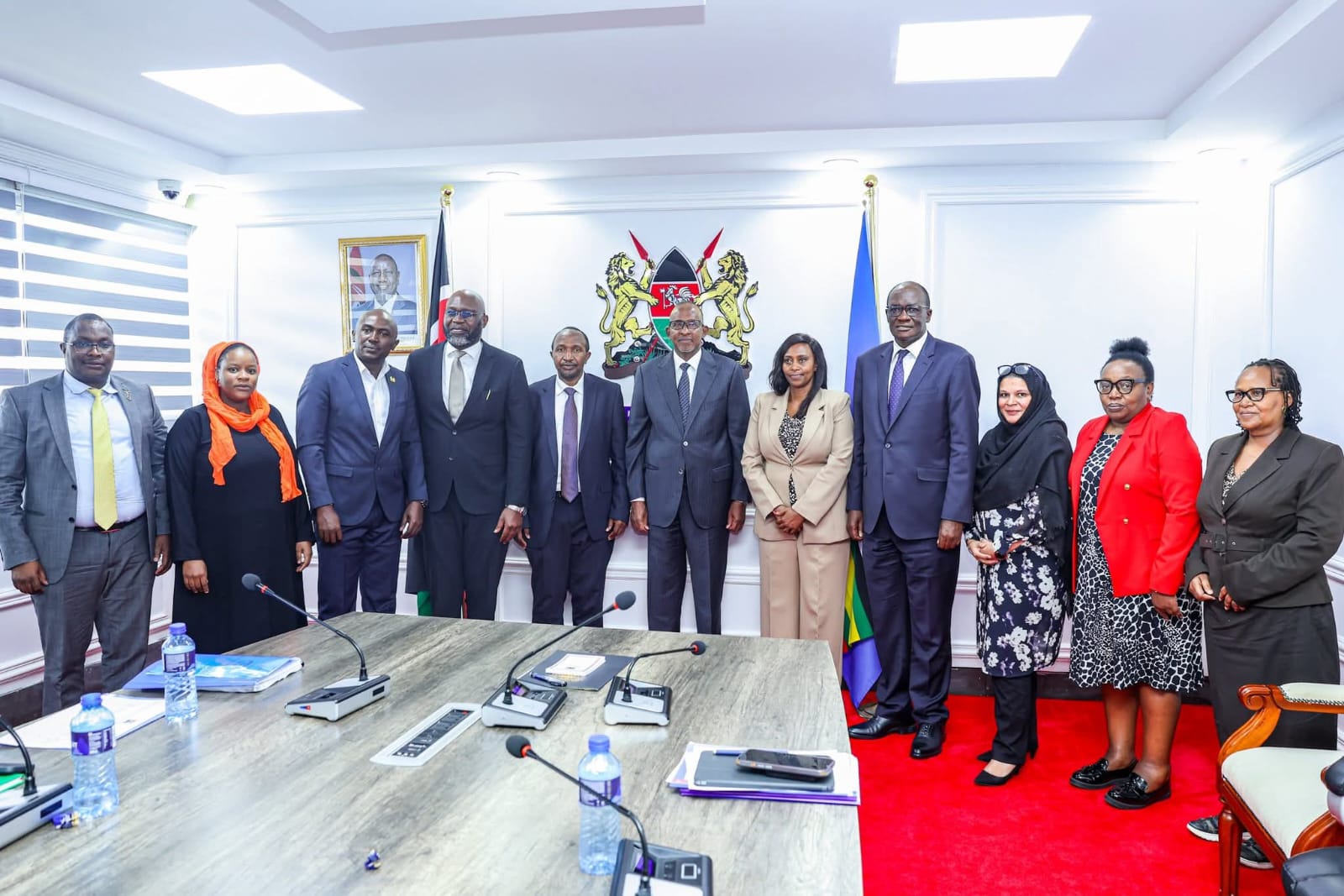 Health CS Aden Duale with his ministry and NQCL officials after the meeting.
