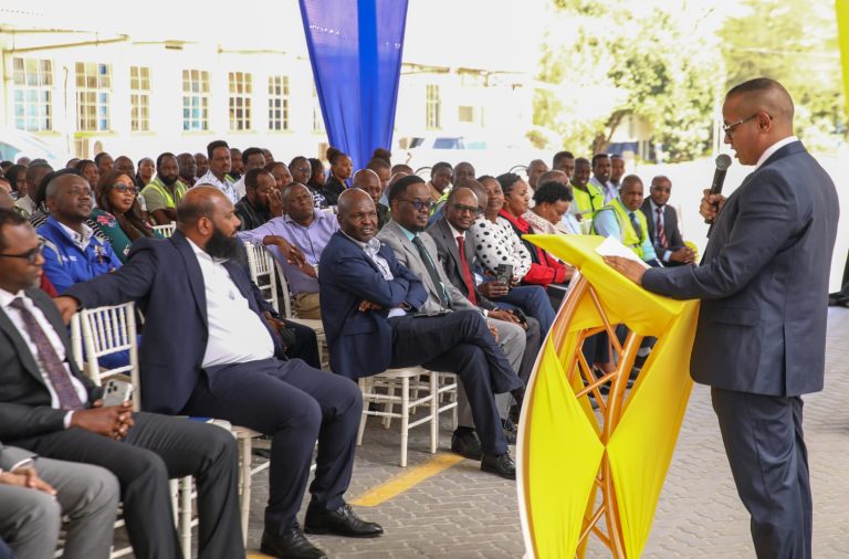 Amsons Group MD Edha Nahdi addressing East Africa Portland Cement staff at the firm's Kitengela manufacturing plant.