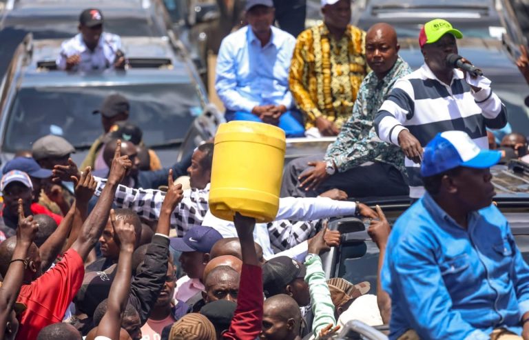 Former Deputy President Rigathi Gachagua addressing Gikomba traders as other United Alternative Government leaders looks on.