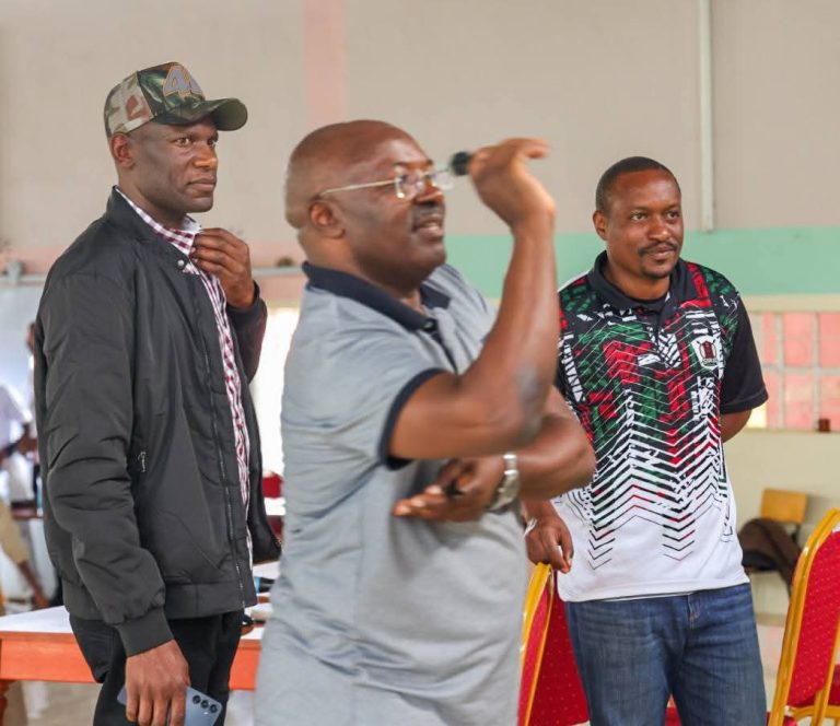 Othaya MP Wambugu Wainaina showcasing his darts playing skills at Othaya NG-CDF hall on Saturday.