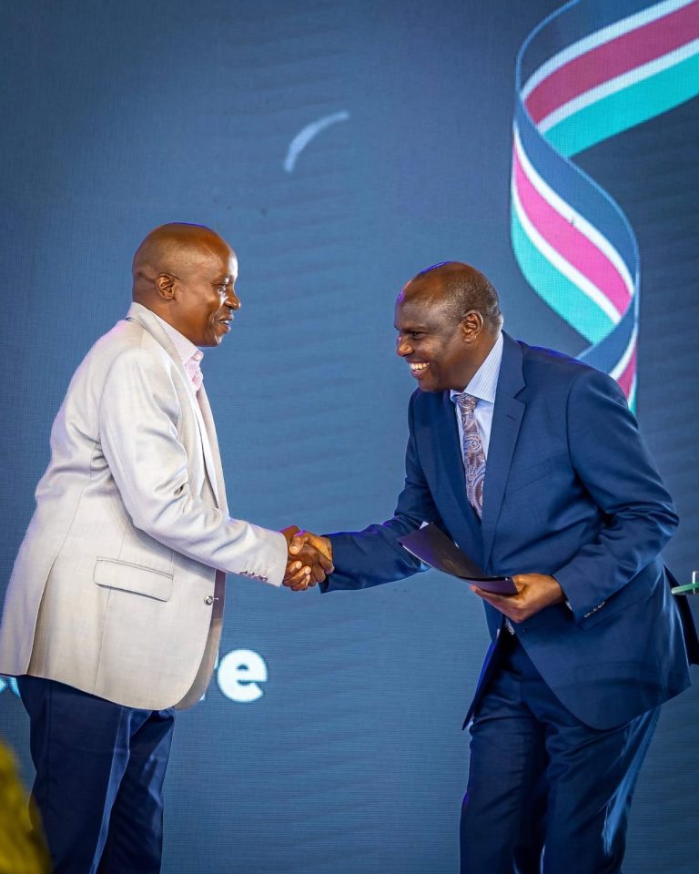 Deputy President Kithure Kindiki being welcomed to address the conference by Head of Public Service Felix Koskei.