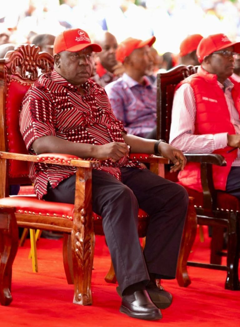 Fred Matiang'i and Ole Kenta during yesterday's meeting.