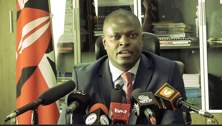 Ndindi Nyoro addressing journalists in his office at KICC on Friday.