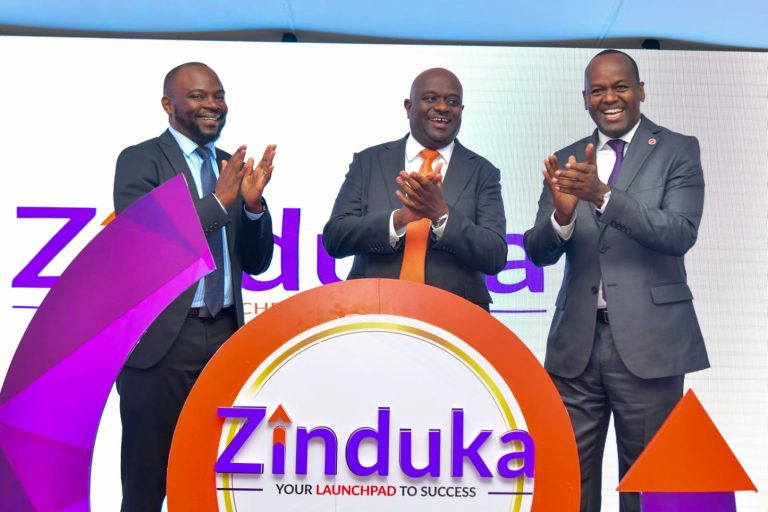 Acorn Holdings CEO Edward Kirathe (center), Absa Bank Kenya MD and CEO Abdi Mohamed (right)