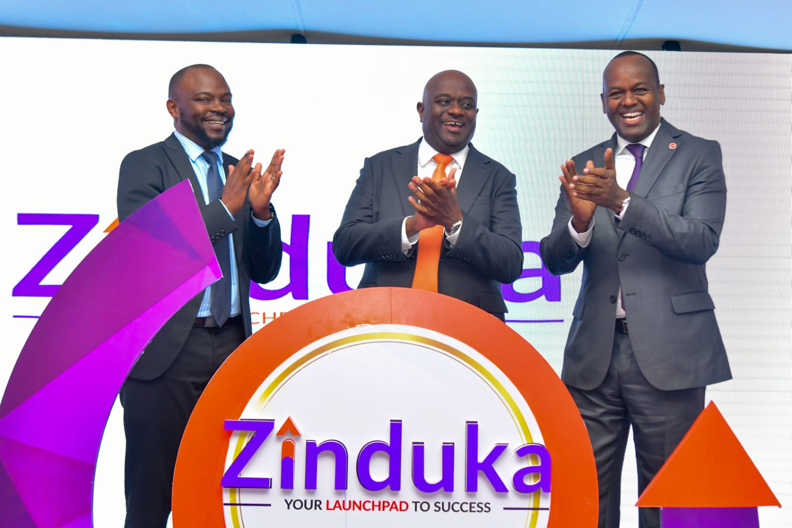 Acorn Holdings CEO Edward Kirathe (center), Absa Bank Kenya MD and CEO Abdi Mohamed (right)