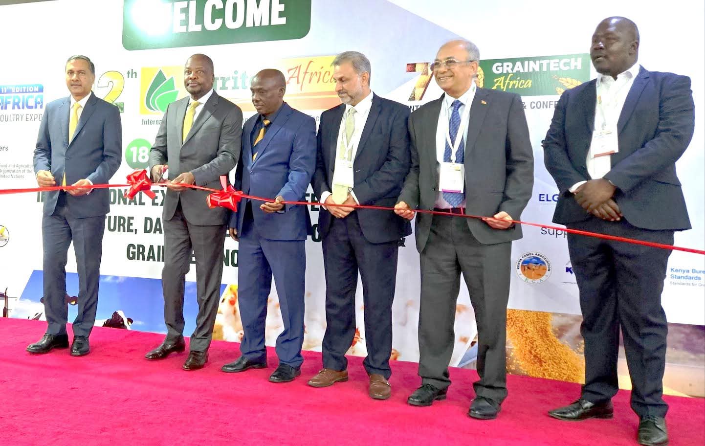 Agriculture and Livestock Development Cabinet Secretary Mutahi Kagwe (second left)