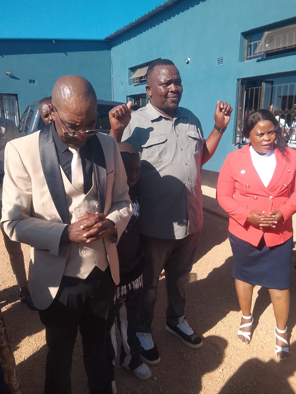 Apostle Mapurazi left, Tapiwa Muganhu in the middle, Mrs Muganhu on the right