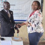 GUPD President Eugene Kavune Nzabonimba with Ambassador Mary Wahogo at Ofafa Jericho Comprehensive School yesterday