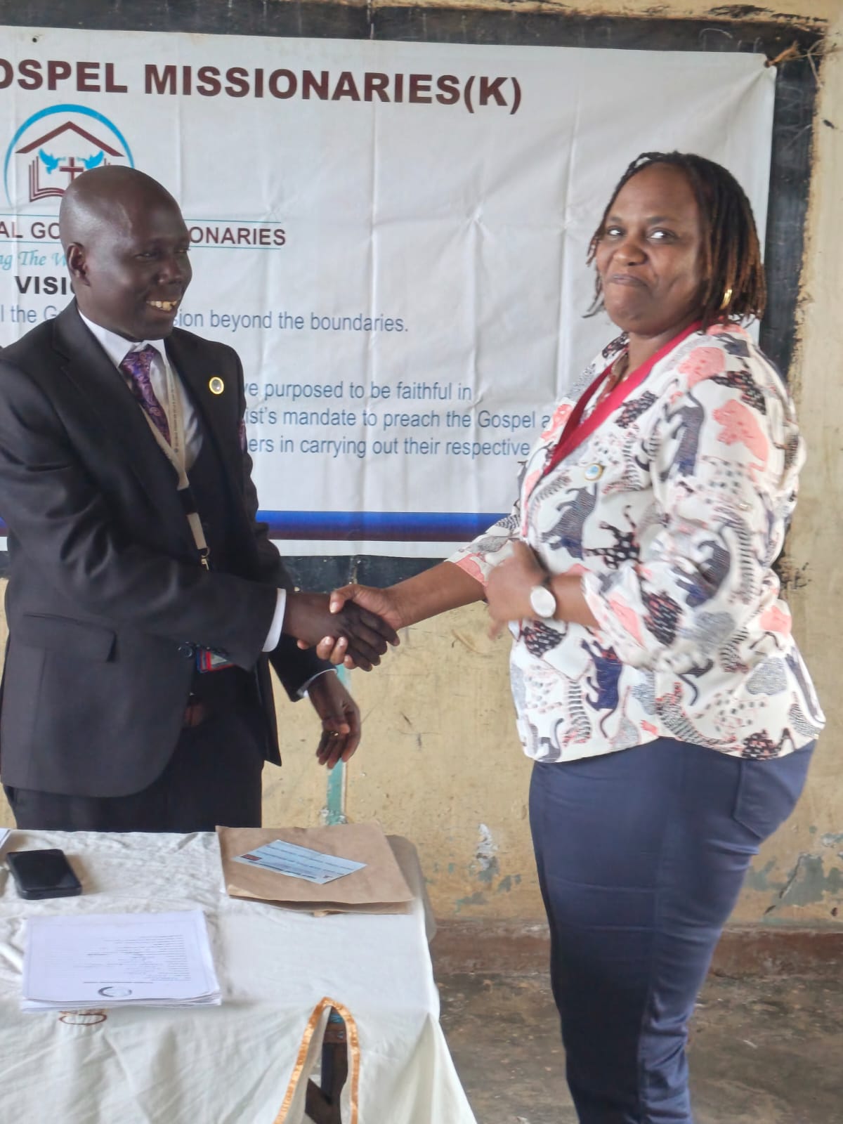 GUPD President Eugene Kavune Nzabonimba with Ambassador Mary Wahogo at Ofafa Jericho Comprehensive School yesterday