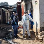 South African Police Service (SAPS) officers along with forensic technicians carry a victim’s body at Jumpers informal settlement in Cleveland, east of Johannesburg, on June 10, 2026. Photo: Courtesy