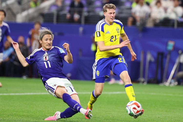 Maeda and Elanga trade blows as Japan and Sweden advance in 1-1 stalemate